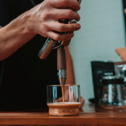 Barista dispensing nitro cold brew